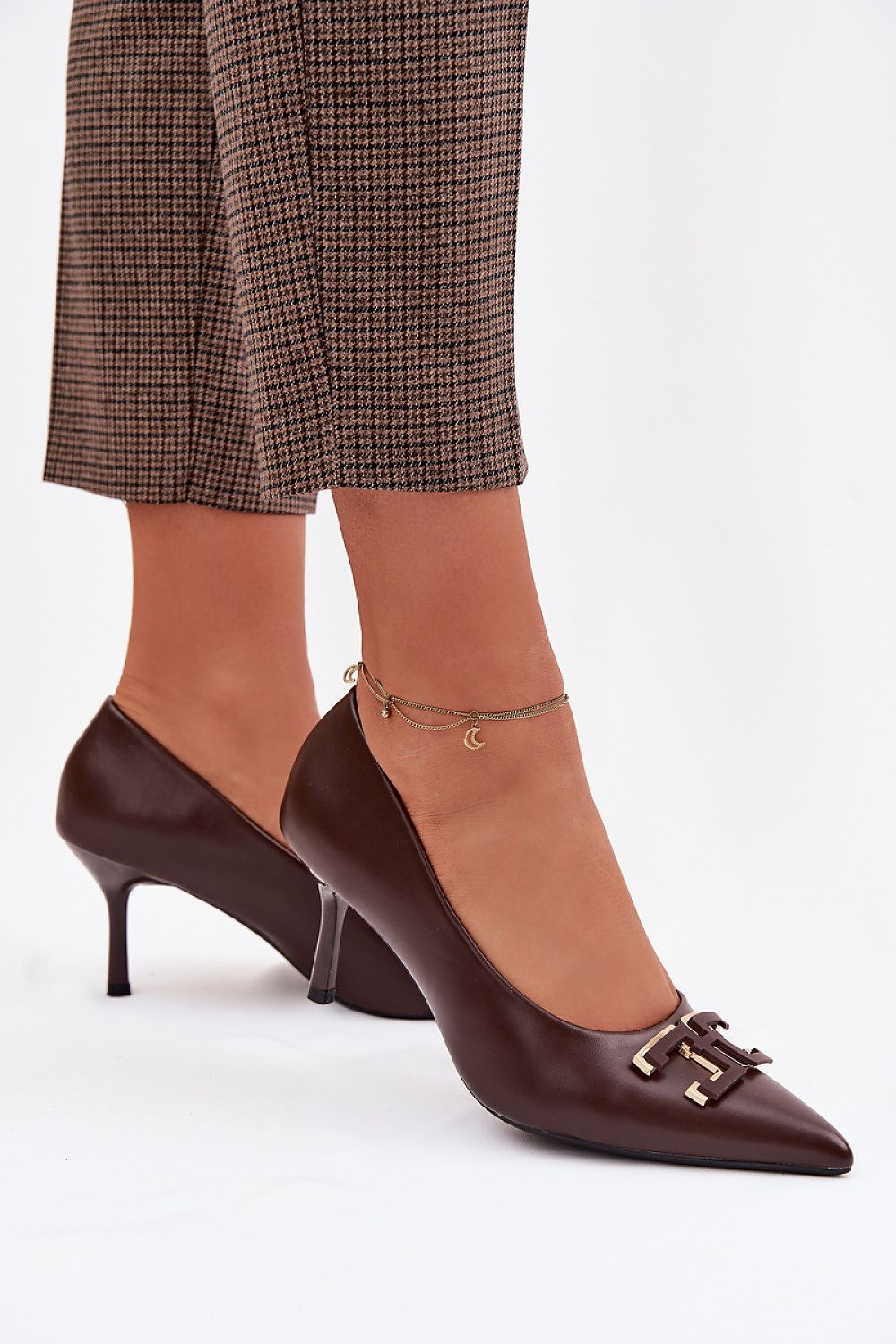 Women's pointed toe stiletto high heel pumps in brown - front view