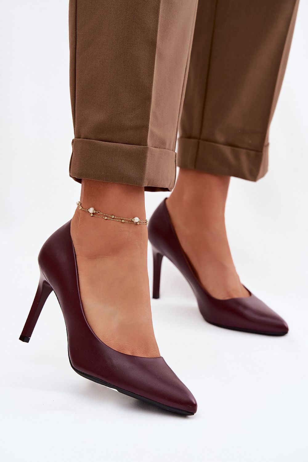 Women's classic pointed toe stiletto pumps in red - front view