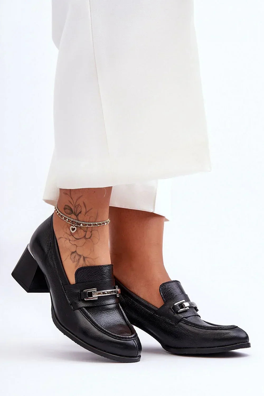 Women's square toe leather block heel pumps in black - front view